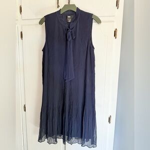 Never worn DKNY Navy blue sheer pleated tie neck dress size 12